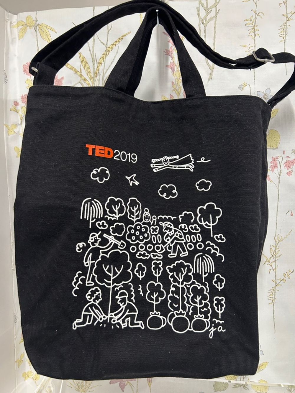 BAGGU Black Tote with White Illustrated Garden and Orange TED 2019 Accent